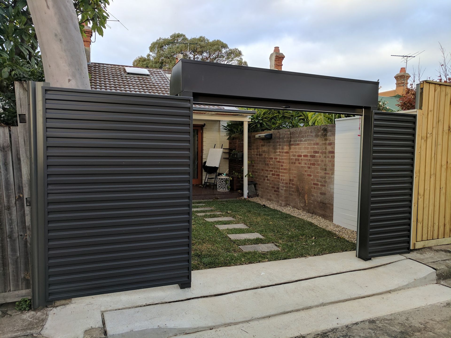 Fence Line Roll-A-Door — Sydney, NSW — Ryde Garage Doors