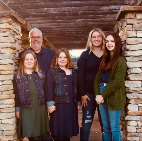 Travis Cole with his family