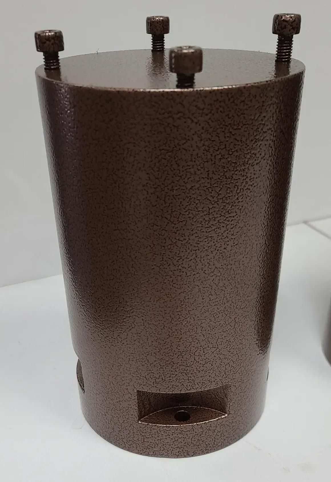 A textured brown cylindrical industrial mold with four bolts protruding from the top, set against a white background.