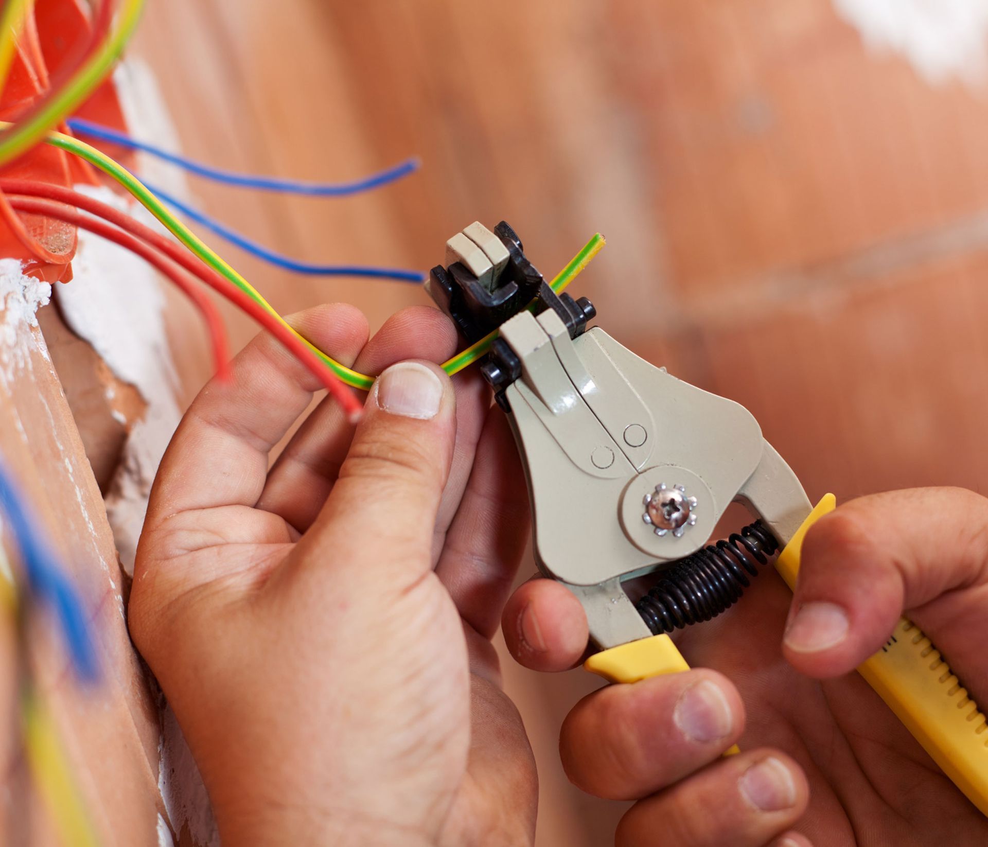 Electrician working with wires
