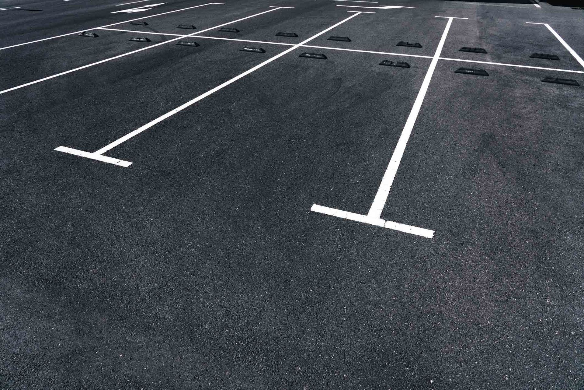 View of empty asphalt parking lot in Summit County, CO, maintained by Double M Asphalt & Coatings In