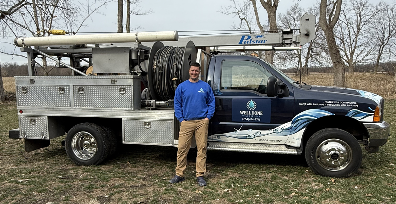 Travis Ostrowski, owner of Well Done Well Services, with his family in Grass Lake Michigan