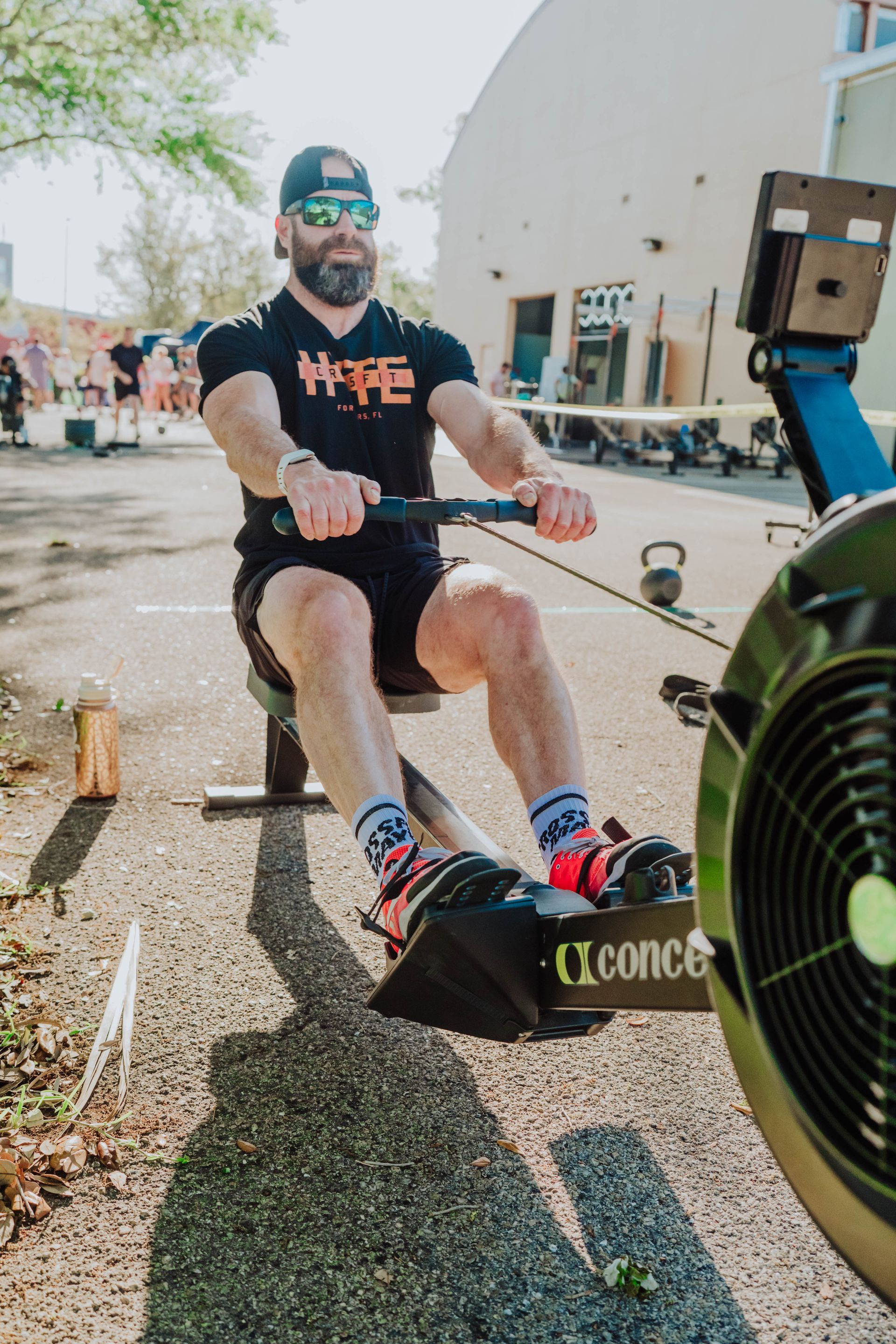 Athlete rowing with proper form during a 500m row workout at HYTE CrossFit in Fort Myers