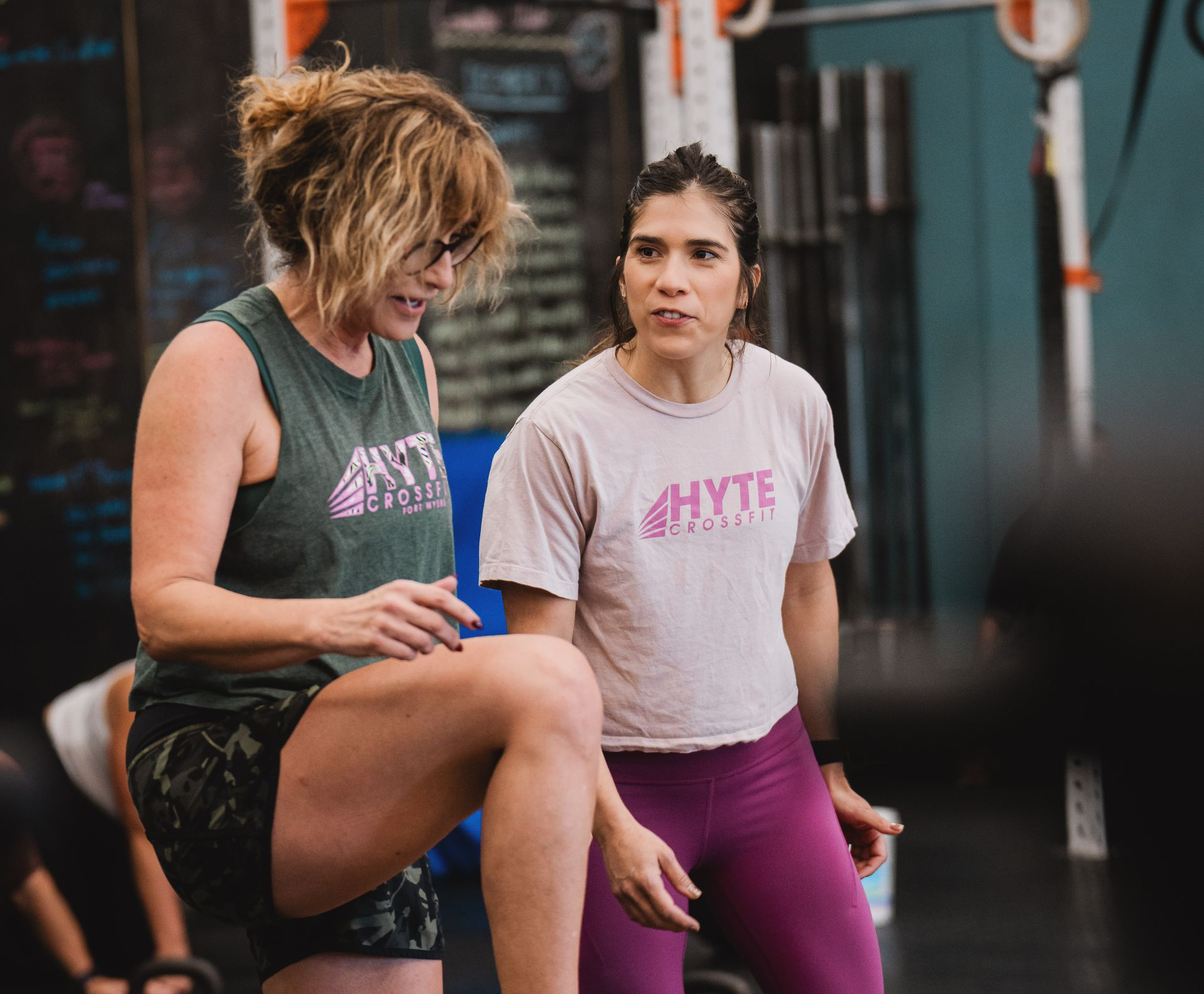 HYTE CrossFit coach working one-on-one with a member in Fort Myers.