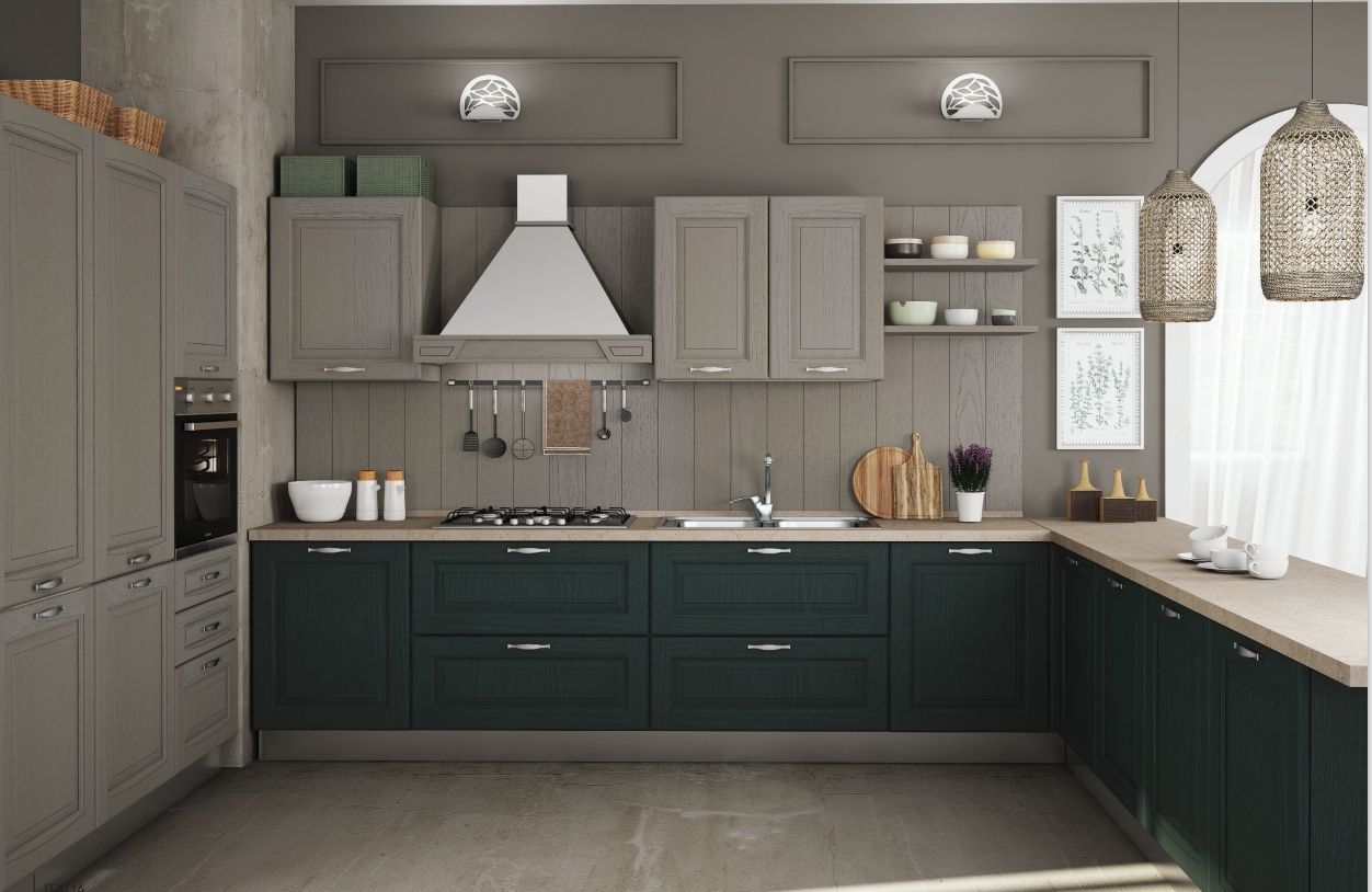 Una cucina con mobili grigi e mobili verdi e un piano cottura con forno.