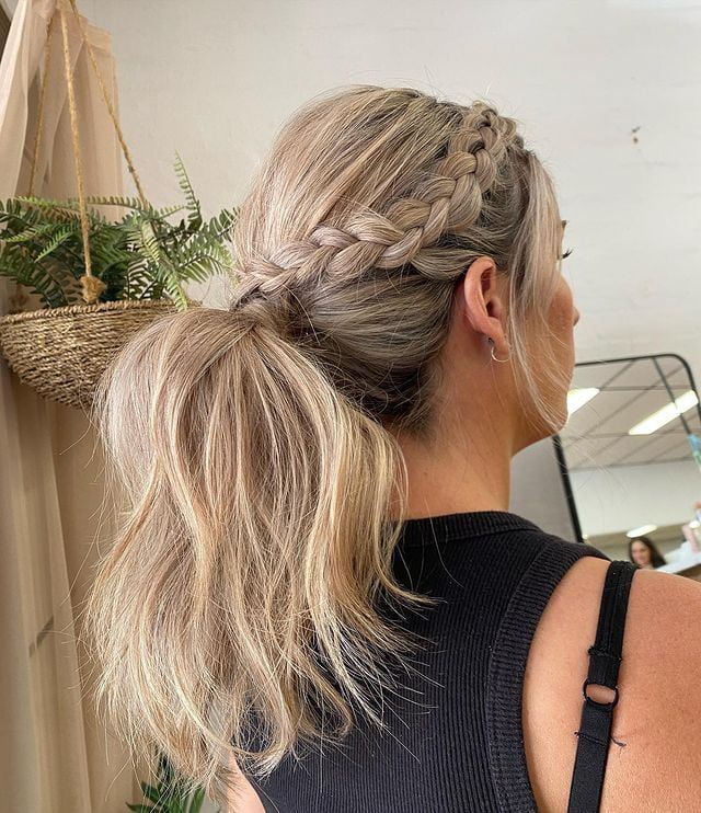 Woman With Blonde Hair Styled in a Braided Headband and Low Ponytail — Lavish Hair in Shepparton, VIC