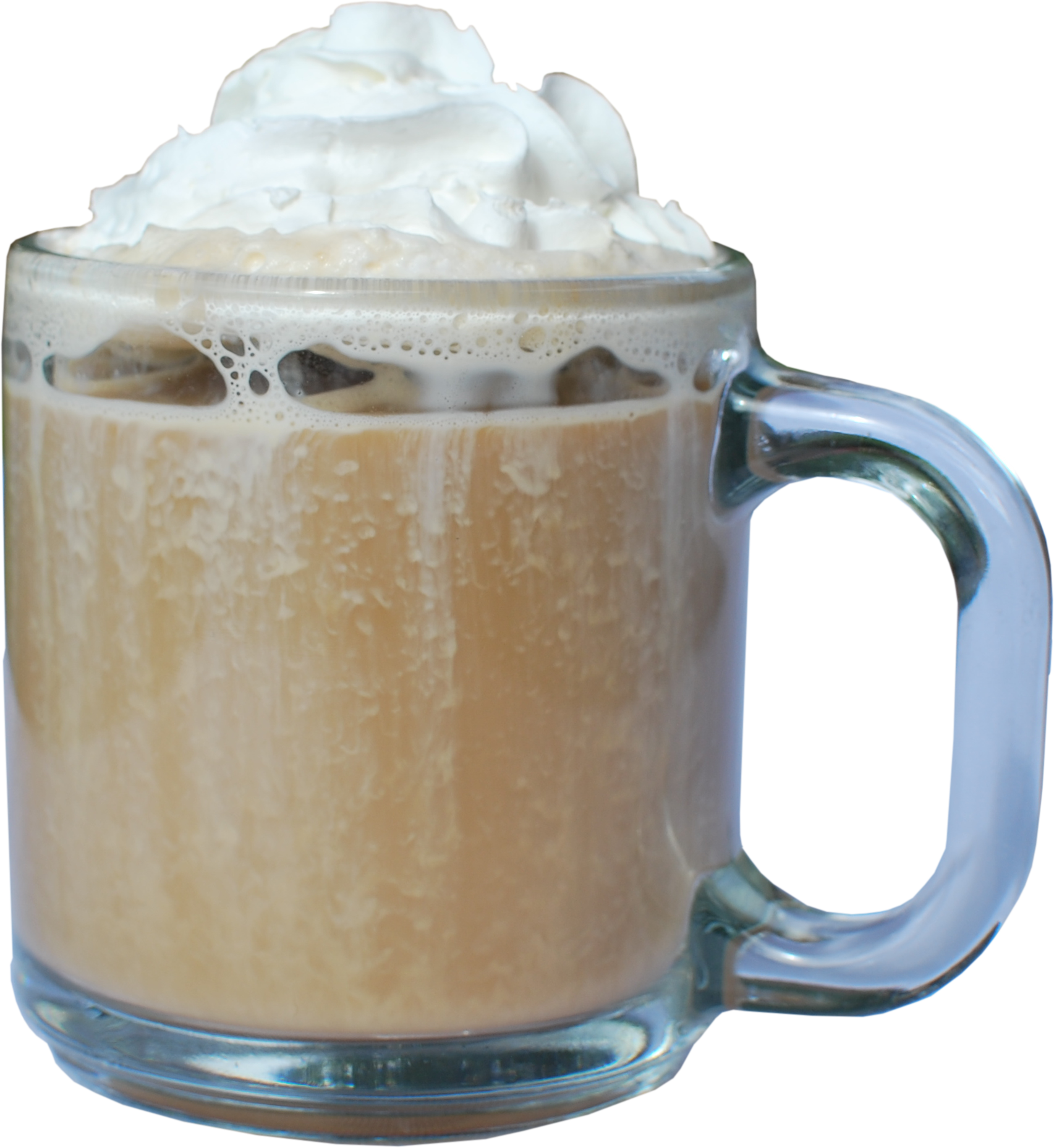 A glass mug of coffee with whipped cream on top