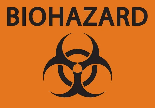 An orange biohazard sign with a black biohazard symbol