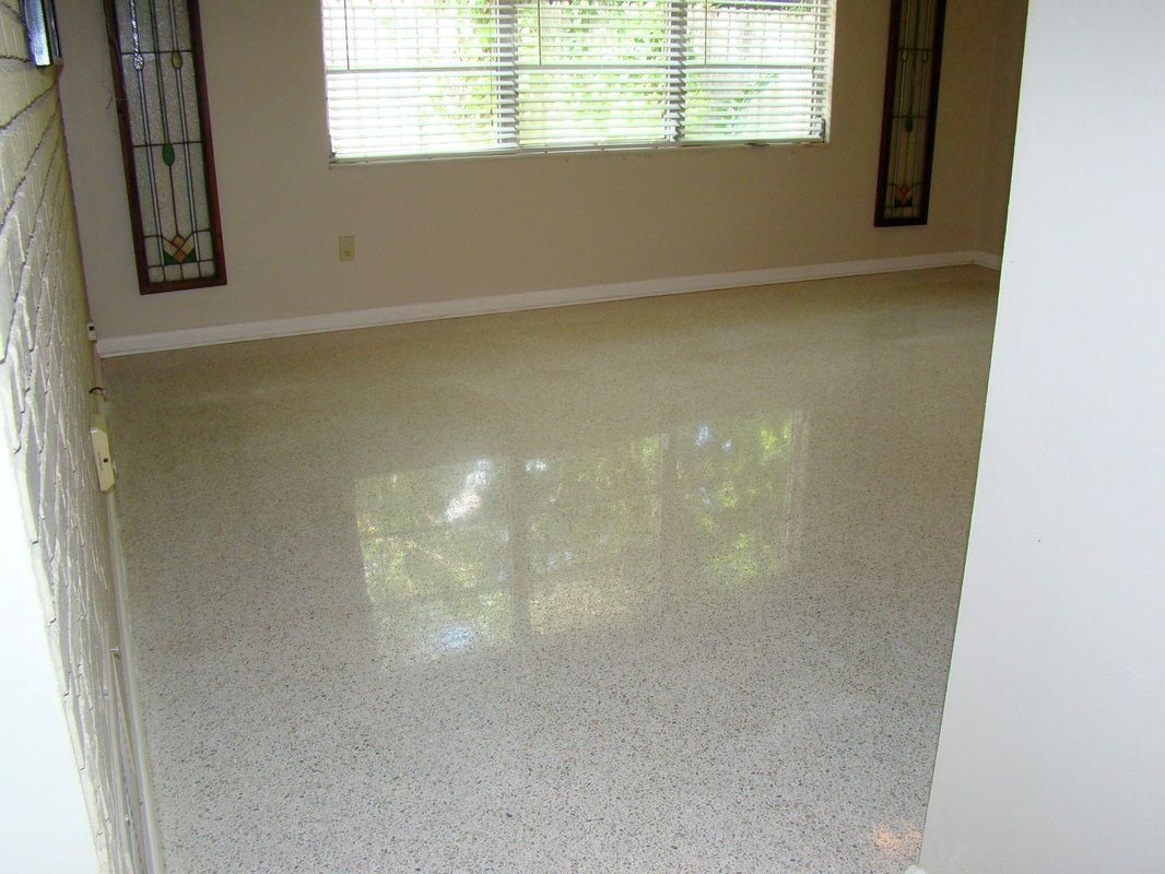 Empty room with polished light-colored floor