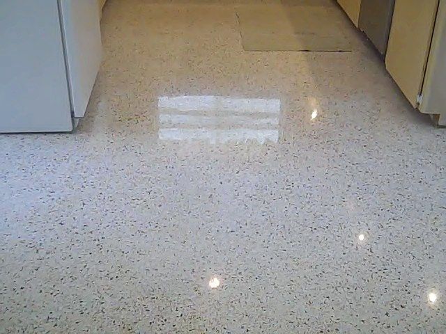 Polished light-colored terrazzo floor