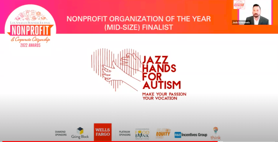 Logo for Jazz Hands for Autism, Nonprofit Organization of the Year finalist. Features hands in a heart and the slogan