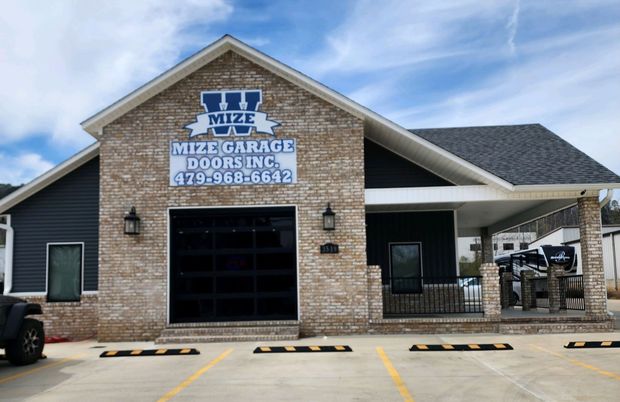 House with white garage doors | Russellville, AR | Mize Garage Doors, Inc. House with white garage doors | Russellville, AR | Mize Garage Doors, Inc.