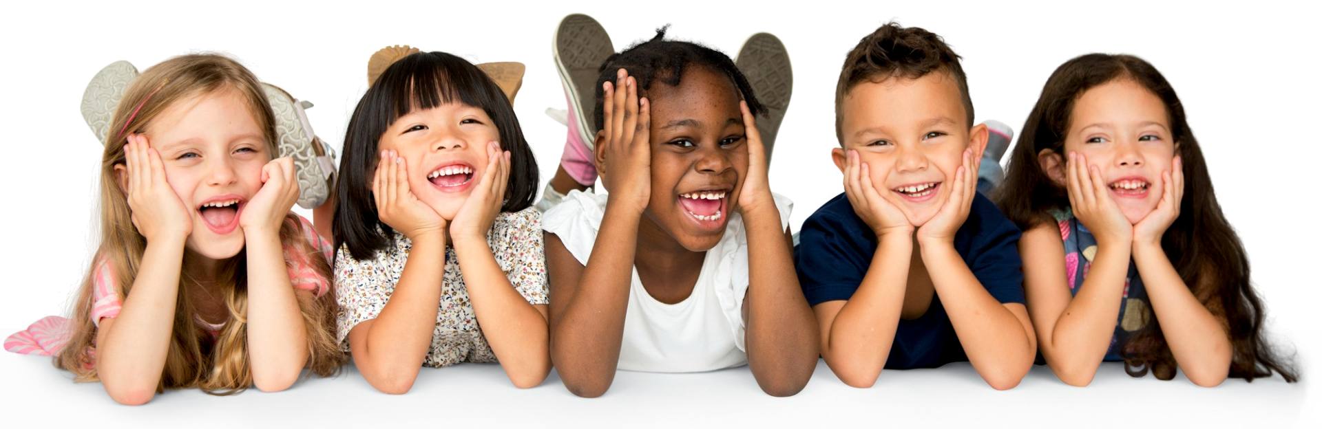 A group of children are laying in a row with their hands on their faces.