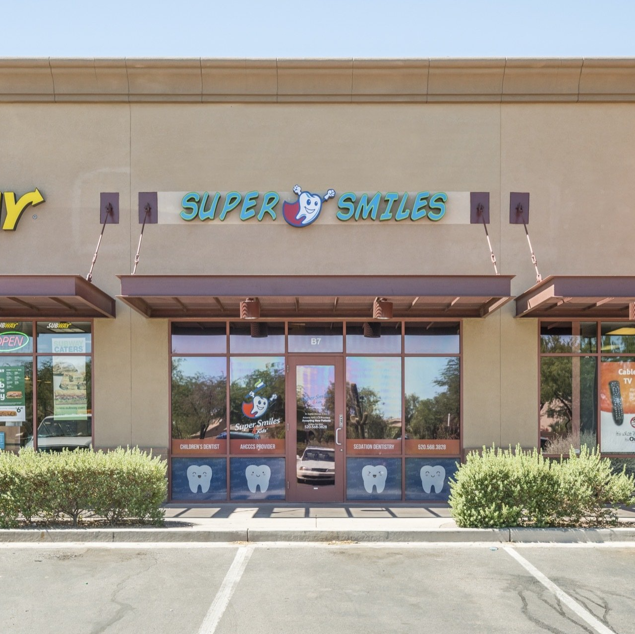 The front of a store called super smiles