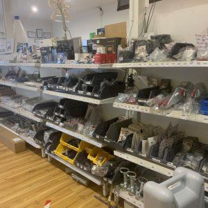 A store filled with lots of shelves filled with lots of items.