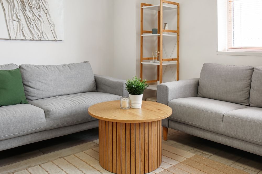A living room with two couches and a coffee table.