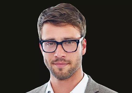 Photo of man with styled hair and trimmed beard for Salon Envy, hair salon in Highland Park, NJ between Edison and New Brunswick.