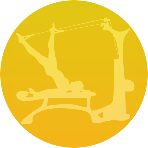 Person giving a treatment to someone lying on a massage table, yellow background.