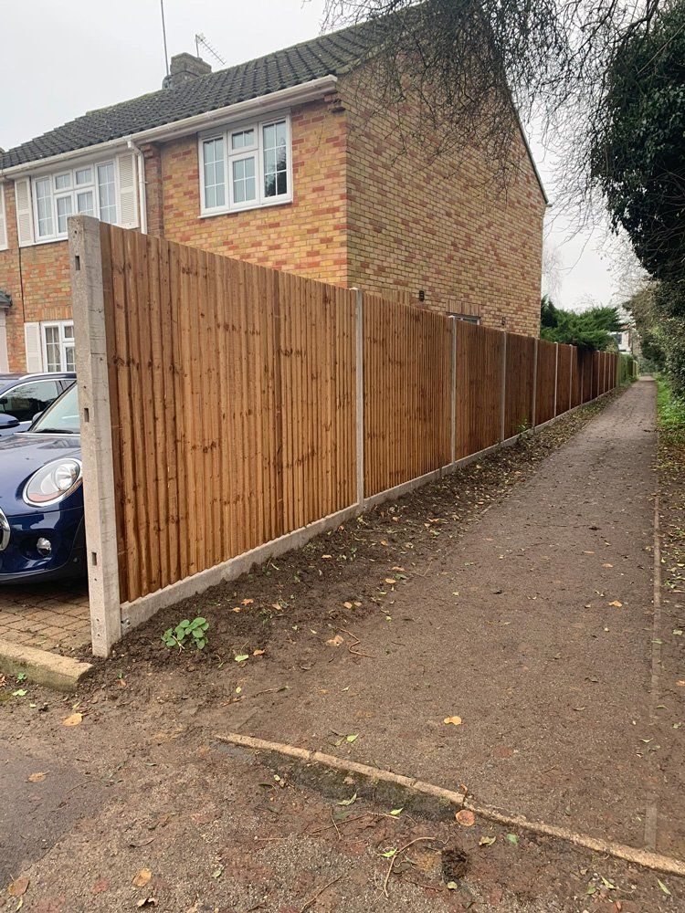 fencing running alongside house