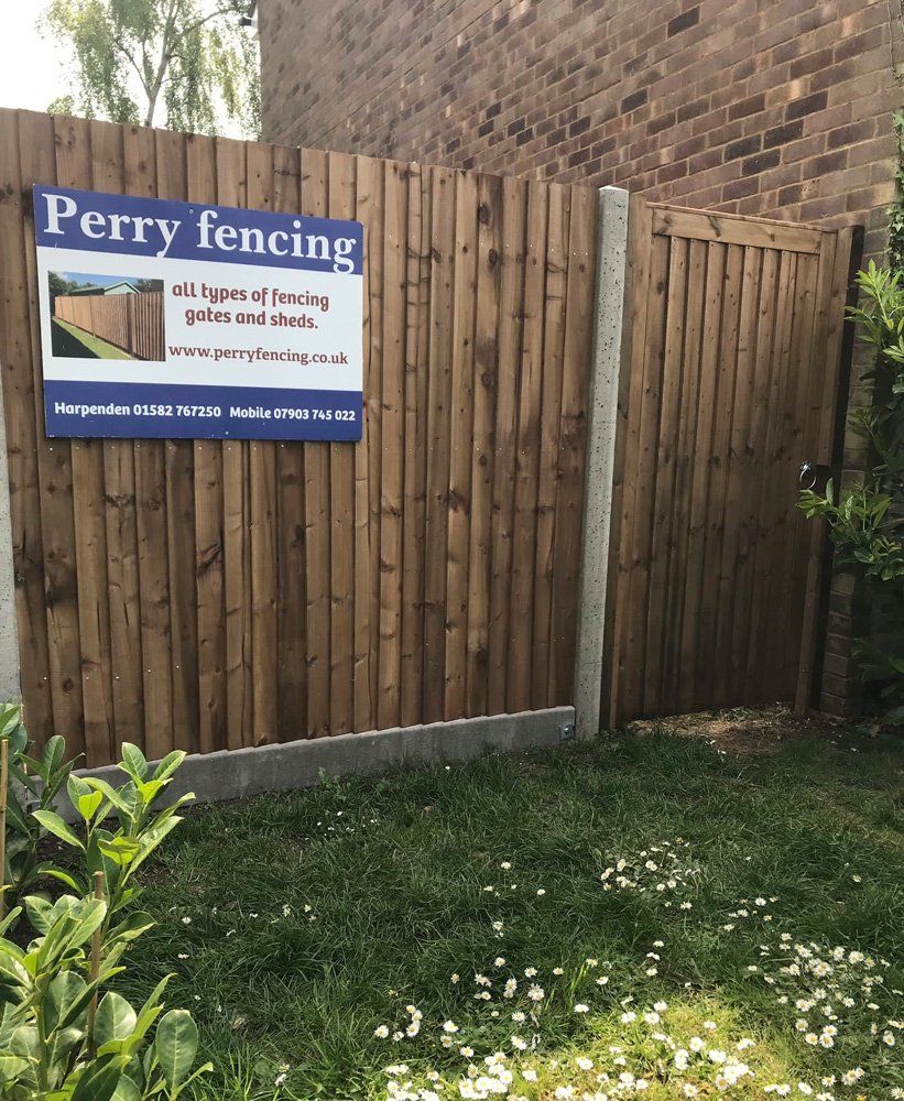 bespoke fence with signage