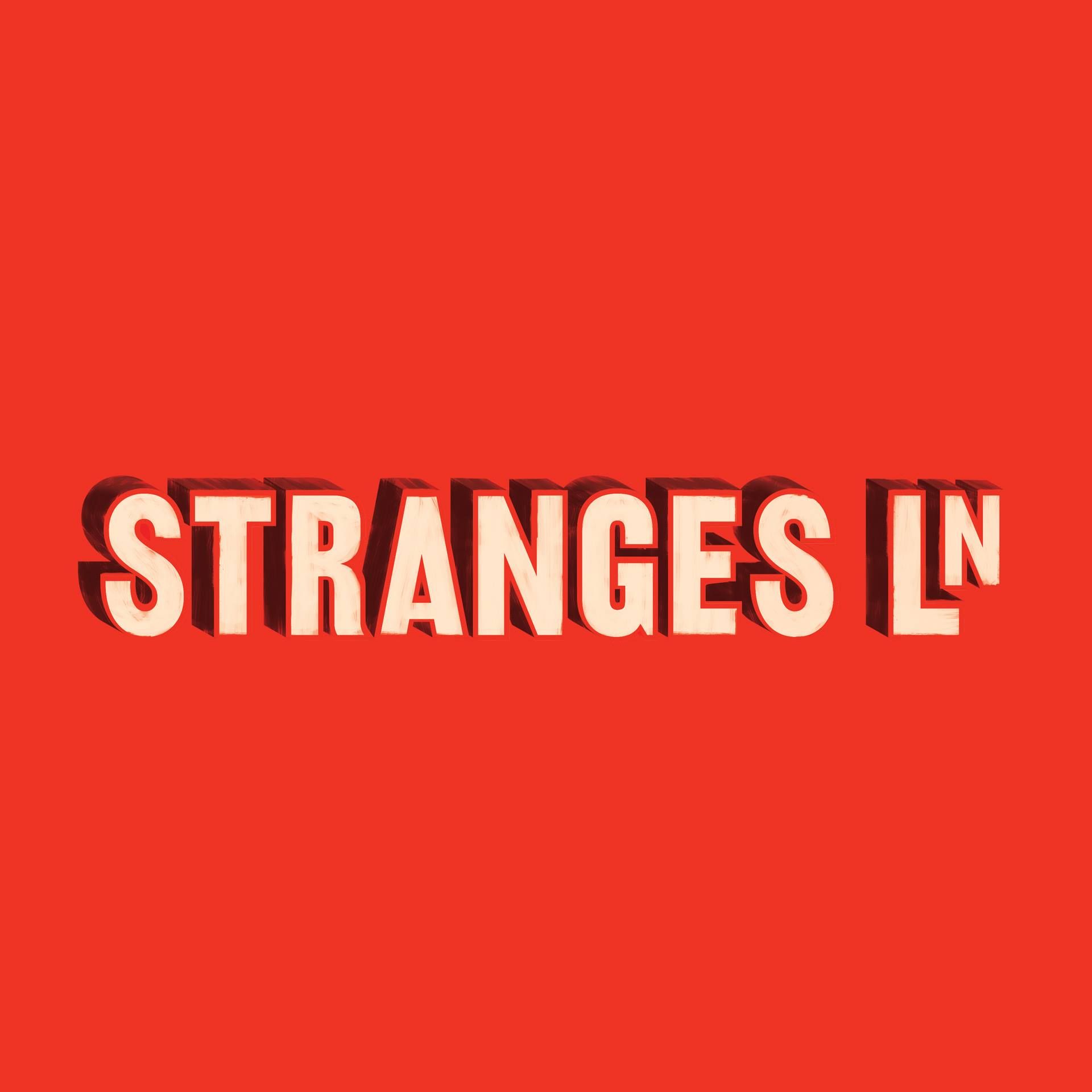 The word strange is on a red background