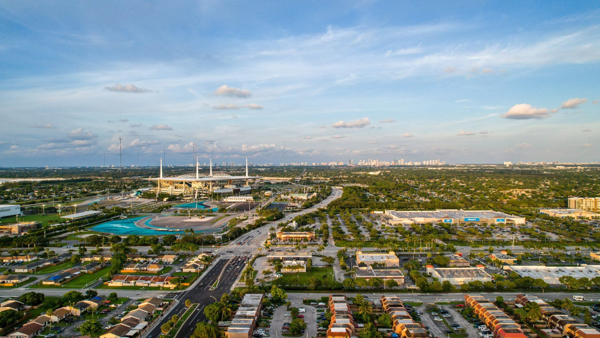 An aerial view of a city with a lot of buildings and trees.