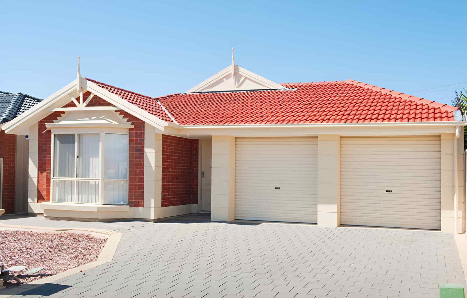 A Small House With A Porch And A Fence In Front Of It  	— McGrath Builders & Associates In Lavington, NSW