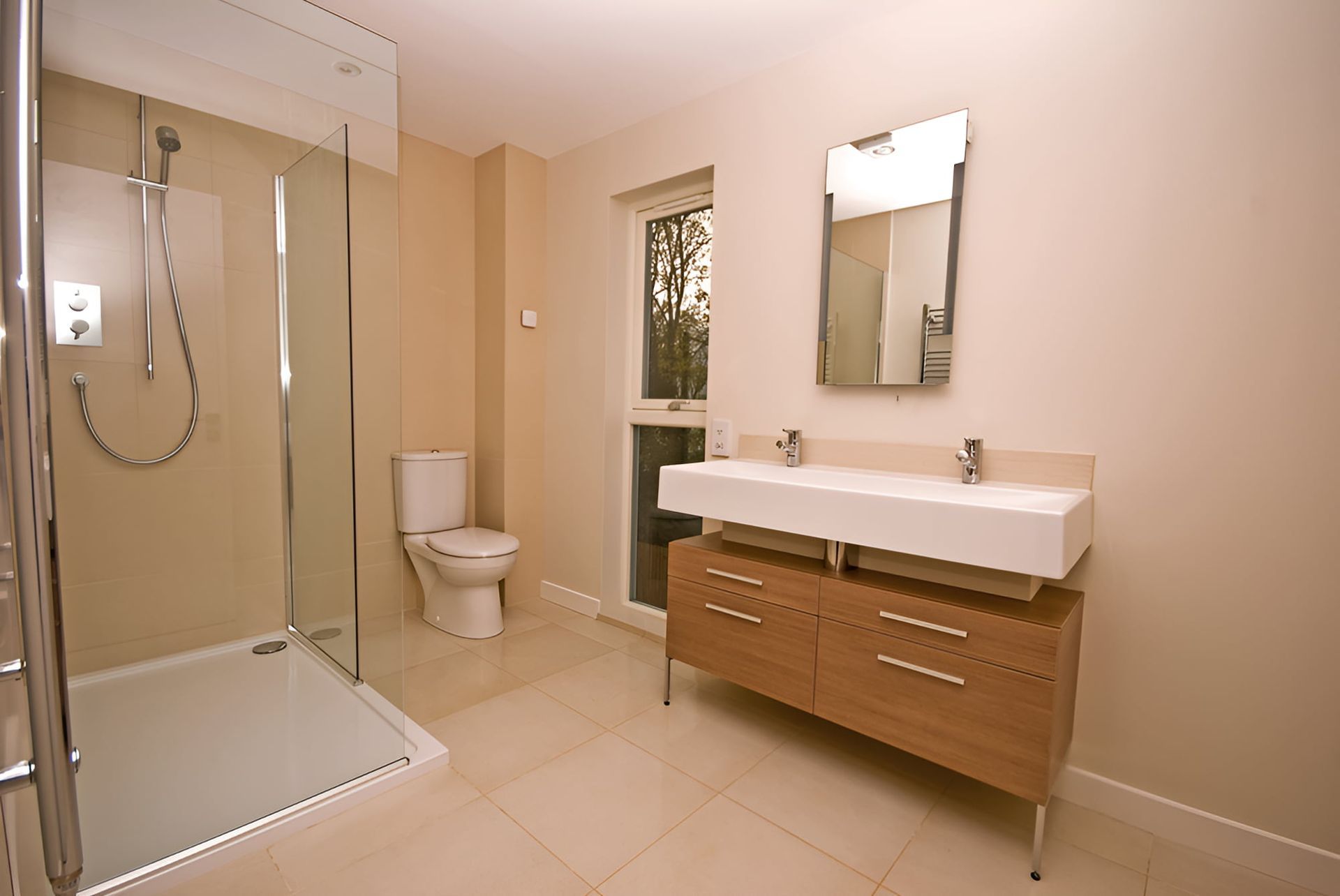 A Bathroom With A Toilet A Sink And A Walk In Shower — McGrath Builders & Associates In Beechworth, VIC