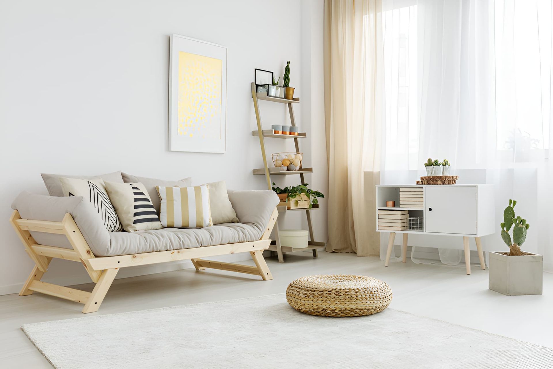 A Living Room With A Wooden Couch And A White Rug — McGrath Builders & Associates In Albury, NSW