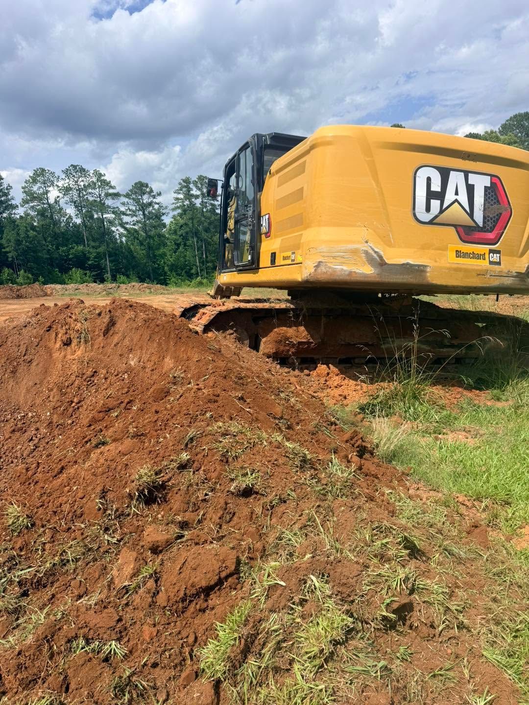 land clearing contractor mill spring