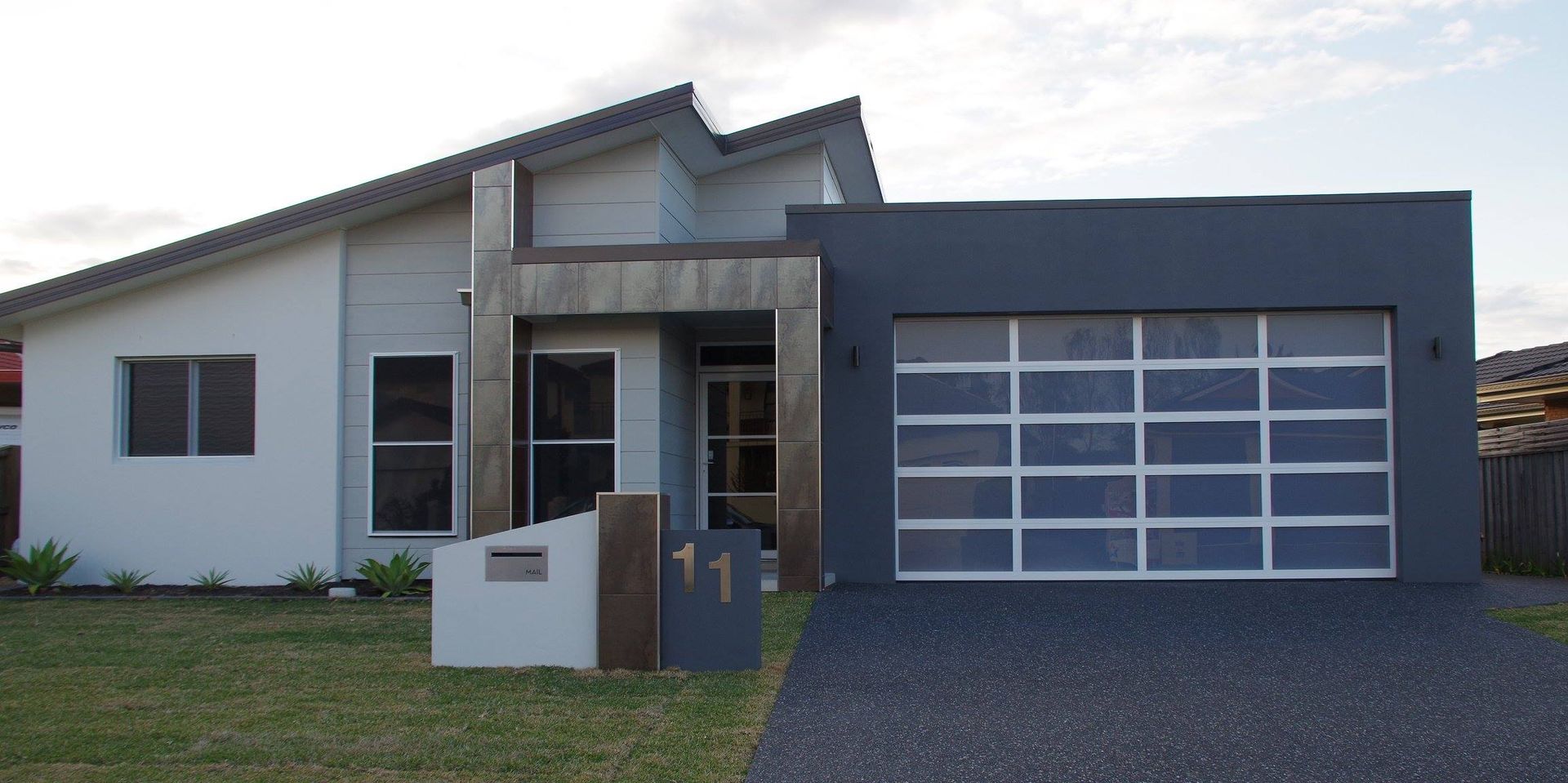 A Modern House With A Garage