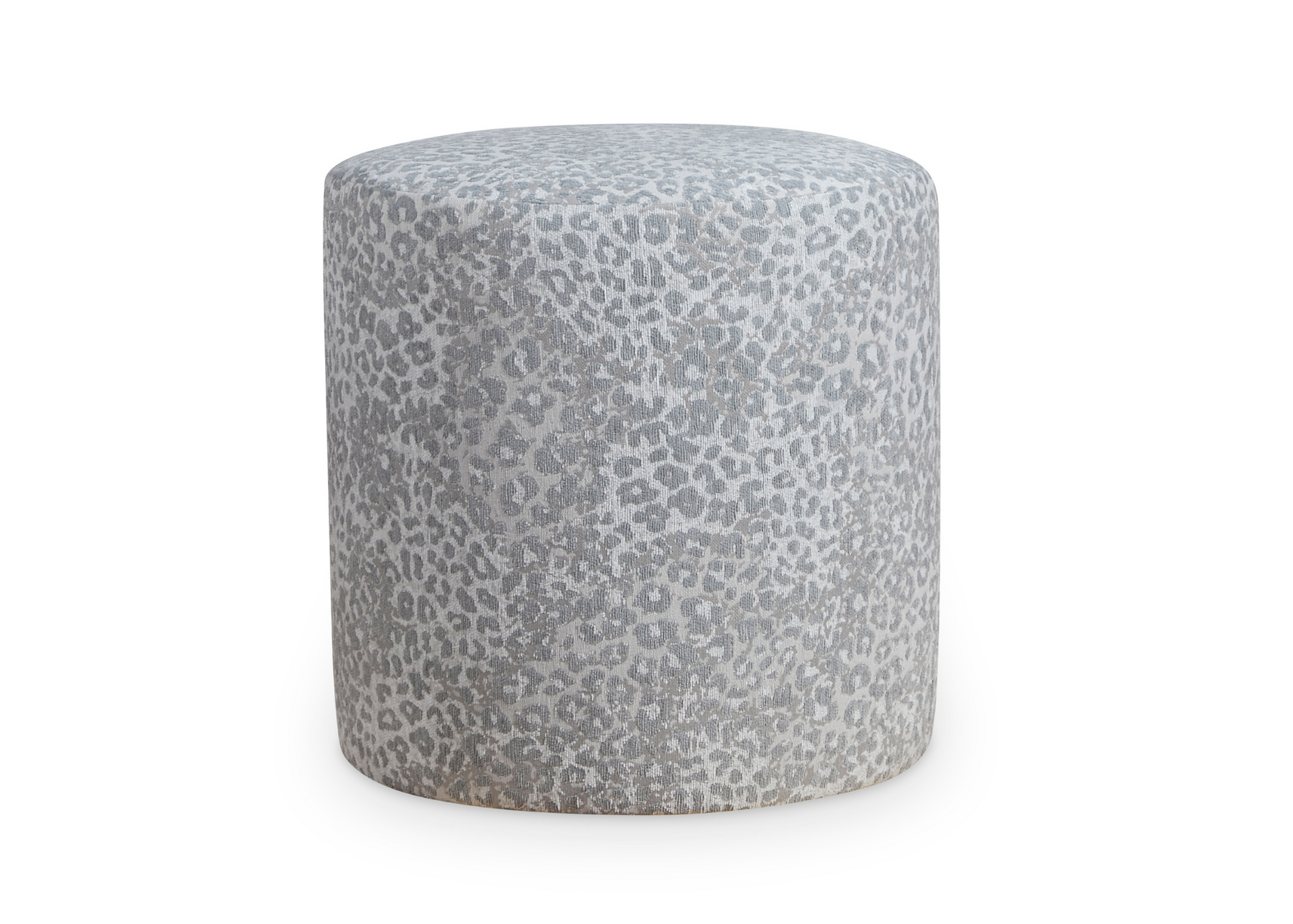 A round ottoman with a leopard print on it on a white background.
