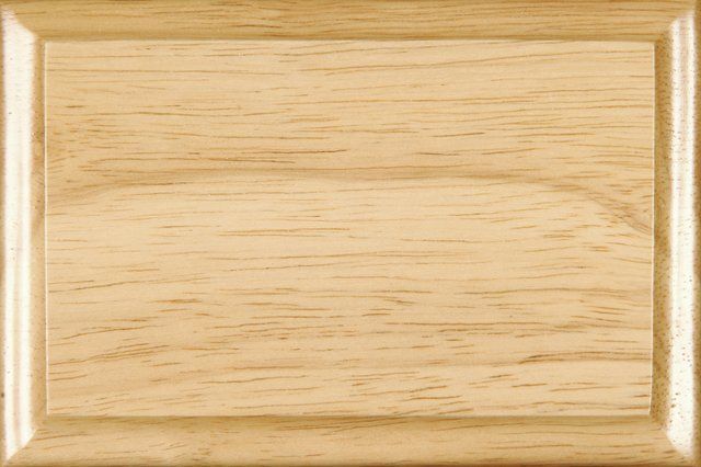 Wooden plaque with a light wood grain and a glossy, raised border.