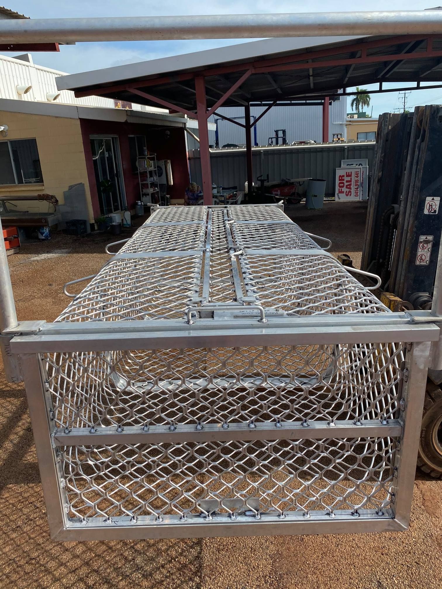 Metal Cage Mounted on a Truck Bed, With Mesh Sides — Greville Fabrication in Girraween, NSW