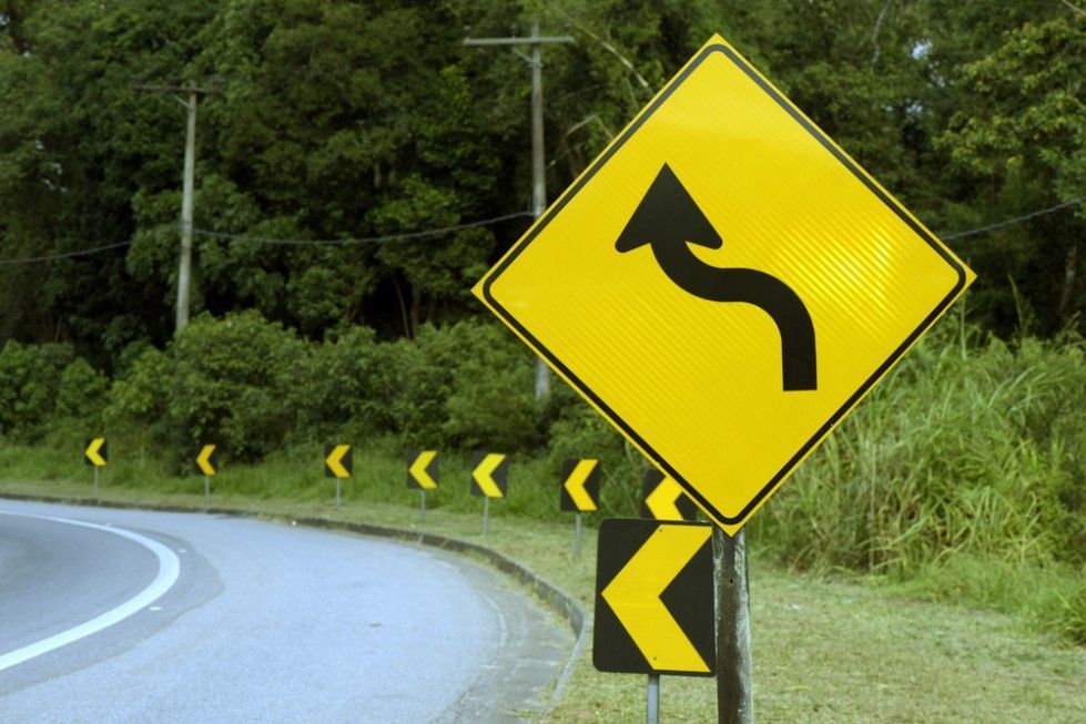 A Yellow Sign With an Arrow Pointing to the Right — Payton Civil Products in Wilsonton, QLD