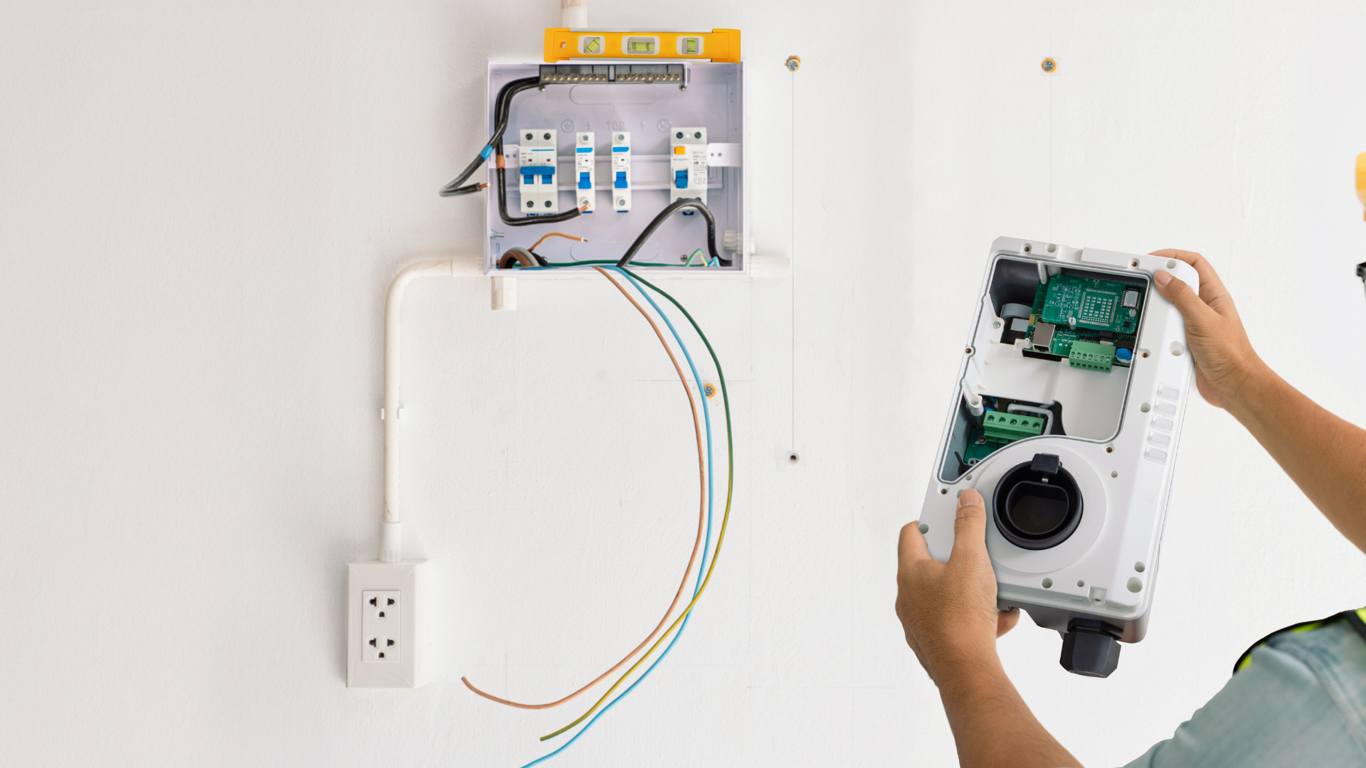 Residential EV charger installers creating customized electric vehicle charging stations for homeowners