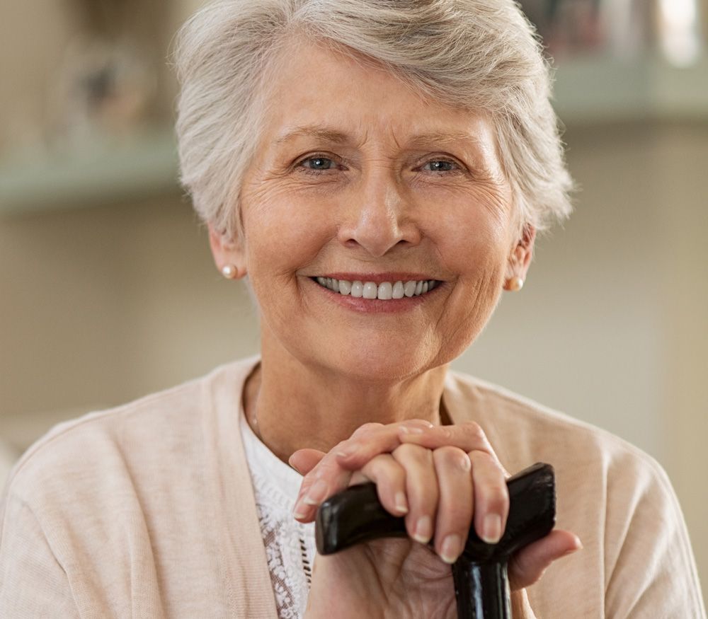 Senior Woman Smiling — Central Coast, NSW — Peninsula Denture Centre