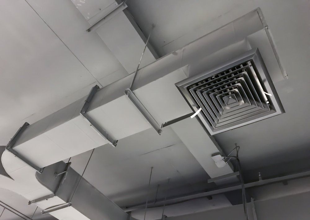 A Black and White Photo of a Ceiling With Ducts and Vents — Northside Air Conditioning Services In Bridgeman Downs, QLD