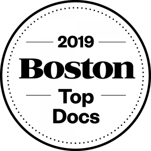 2019 Boston Top Docs award badge: black text on a white background, circular shape.