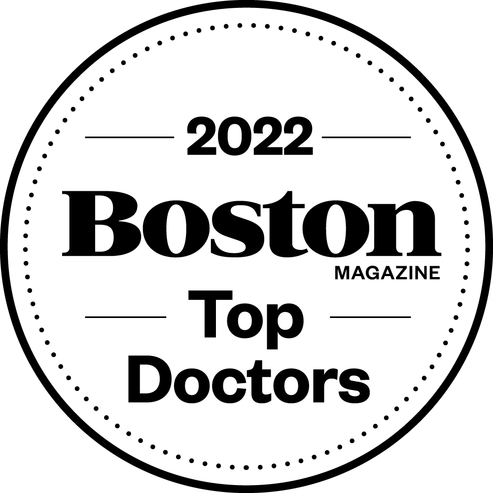 2022 Boston Magazine Top Doctors badge, black text on white circle with dotted border.