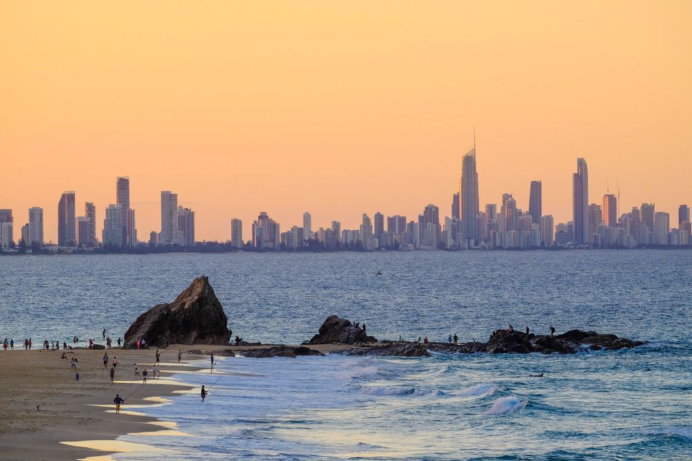 Sea With Building On The Background — Experienced Roofer in Gold Coast, QLD