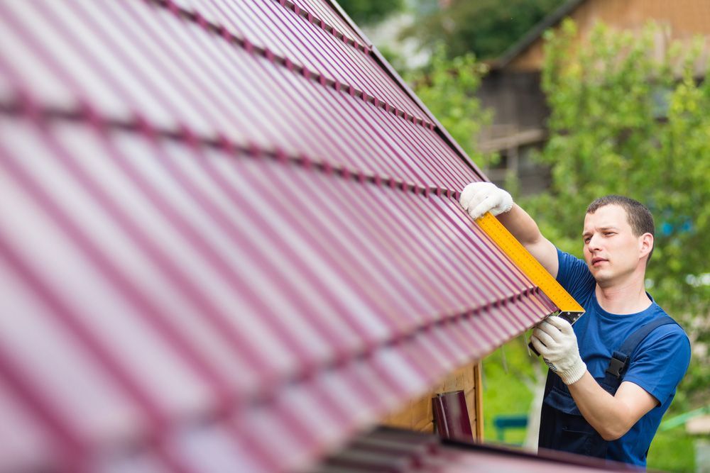 Closeup Red Tiled Metal Roofing — Experienced Roofer in Sunshine Coast, QLD
