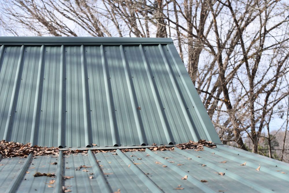 Panels On A Metal Roof — Experienced Roofer in Gold Coast, QLD