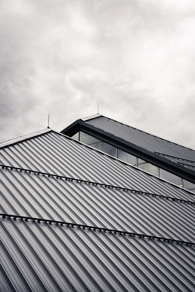 Gray Metal Roofing Of Building — Experienced Roofer in Rangeville, QLD