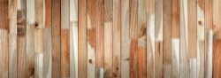 Wooden planks of varying shades arranged vertically.