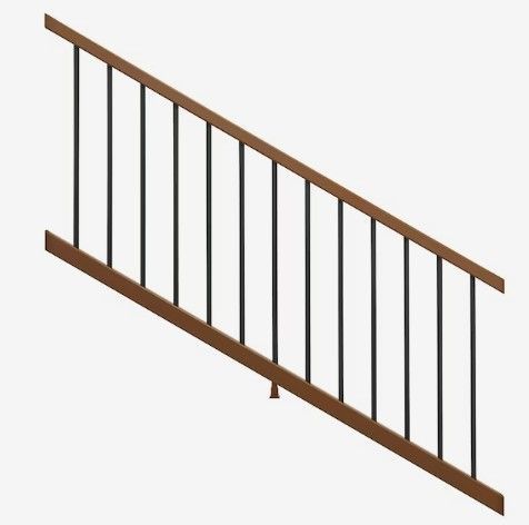 A wooden railing with black bars on a white background.
