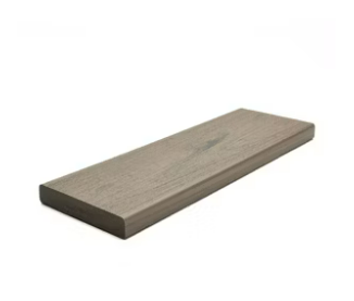 A piece of wood is sitting on a white surface.