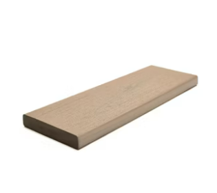 A piece of wood is sitting on a white surface.