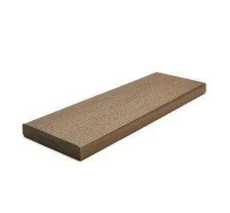 A piece of wood is sitting on a white surface.