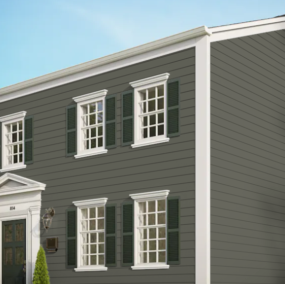 A gray house with white trim and black shutters